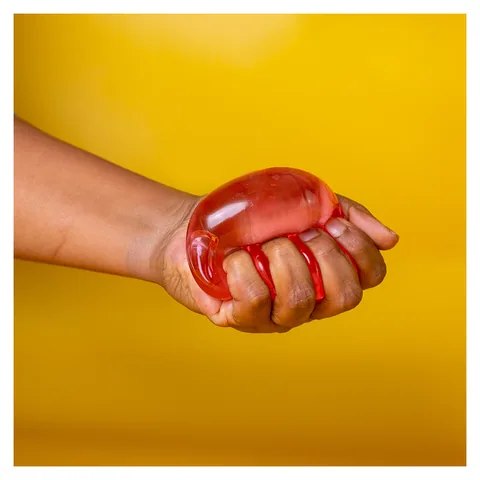 Jelly Cube Sensory Toy Red squeezed